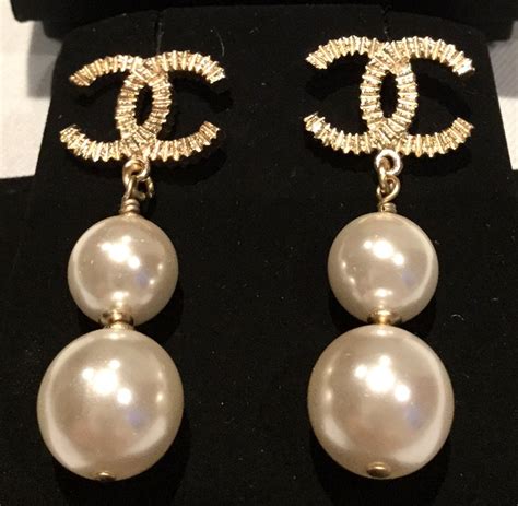 authentic chanel pearl earrings.